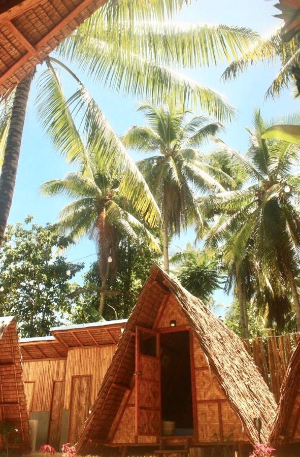 فندق Catangnanفي  "Triangle Hut" Camp Fuego Siargao المظهر الخارجي الصورة