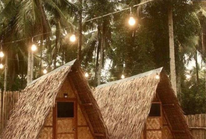 فندق Catangnanفي  "Triangle Hut" Camp Fuego Siargao المظهر الخارجي الصورة